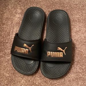 Puma black and rose gold slides